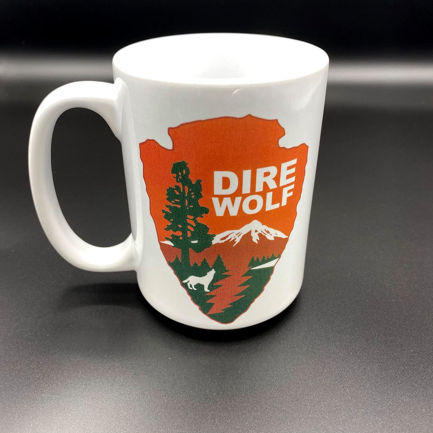 A white ceramic cup with a an image inspired by the Grateful Dead Song