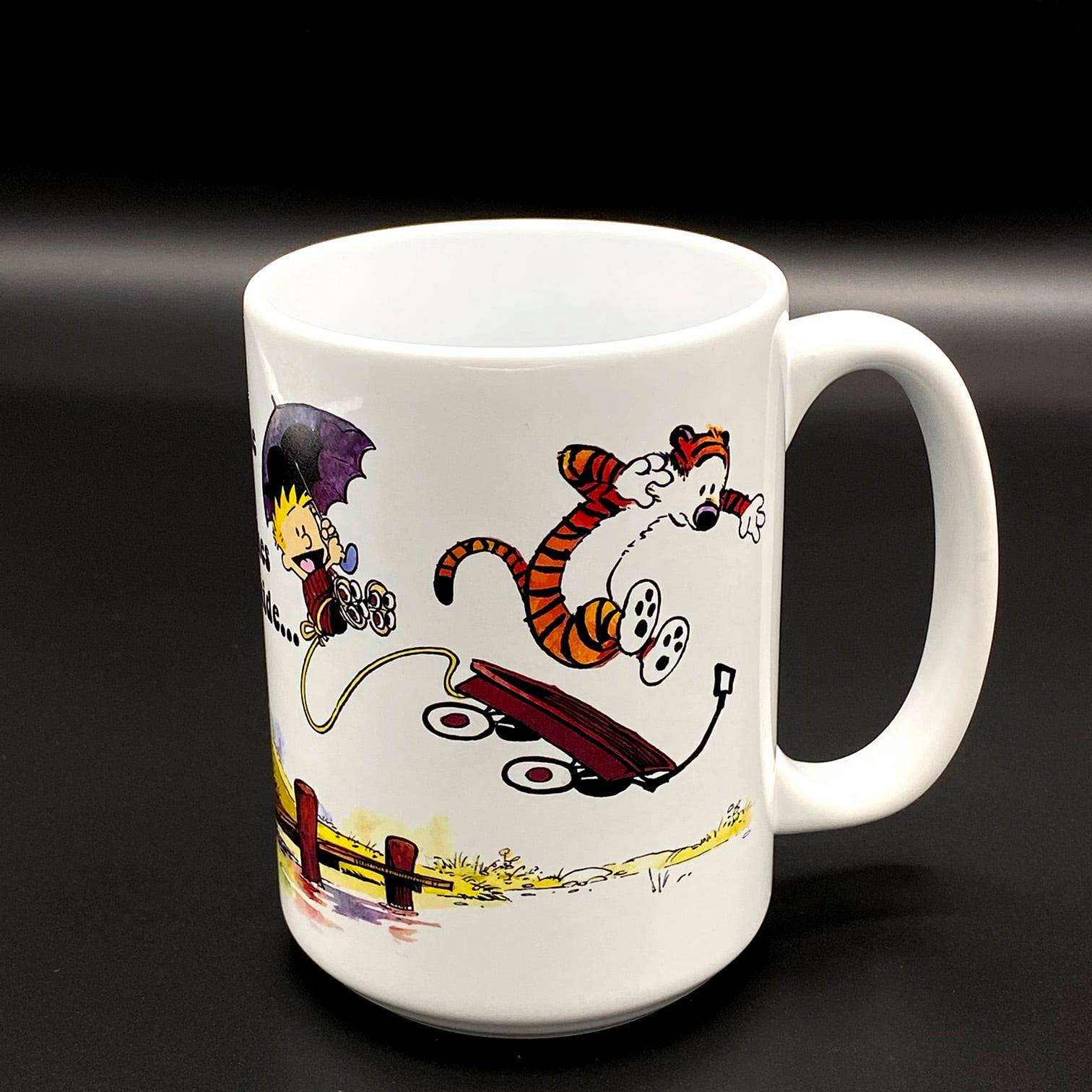 A white ceramic cup with a an image inspired by the Grateful Dead Song